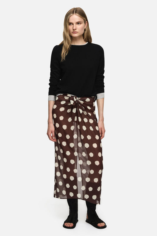 Image of a model wearing Skirts. Product name - Linnea Skirt Brown in Brown colour by brand - Blanca Studio