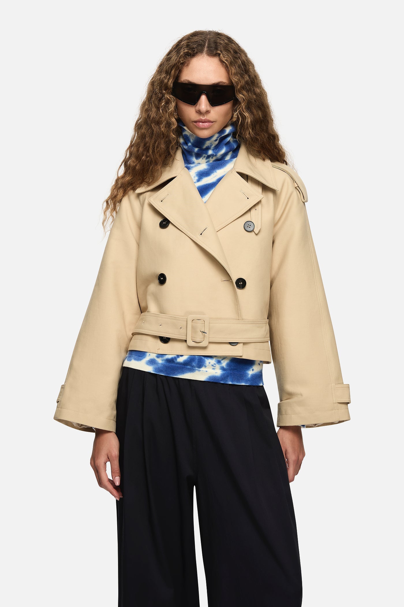 Image of a model wearing Outerwear. Product name - Pamela Trench Cream in Cream colour by brand - Blanca Studio