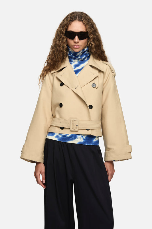 Image of a model wearing Outerwear. Product name - Pamela Trench Cream in Cream colour by brand - Blanca Studio