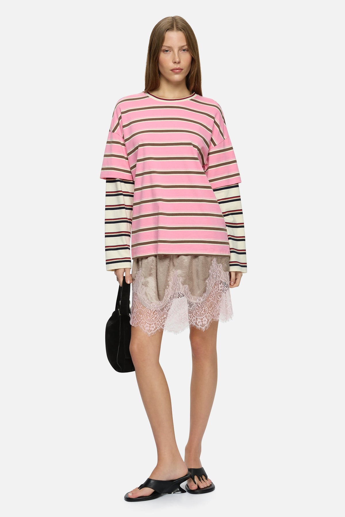 Image of a model wearing Tops. Product name - Faro Tee Sorbet in Sorbet colour by brand - Blanca Studio