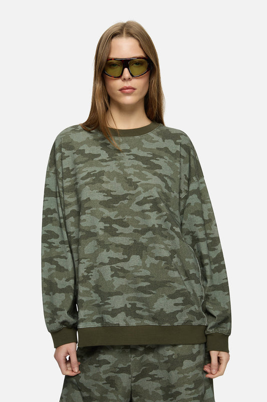 Image of a model wearing Outerwear. Product name - Indi Sweater Khaki in Khaki colour by brand - Blanca Studio