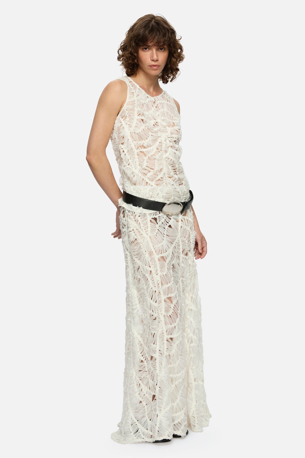 Image of a model wearing Tops. Product name - Liore Top Cream in Cream colour by brand - Blanca Studio