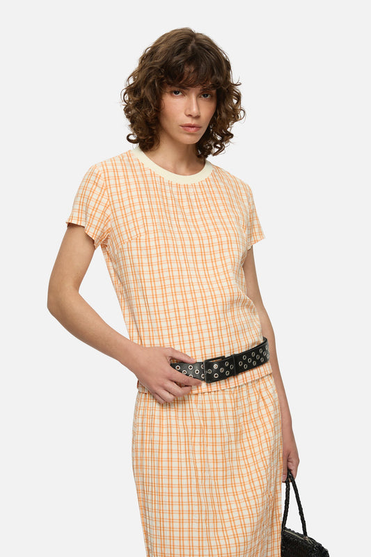 Image of a model wearing Tops. Product name - Rico Top Orange in Orange colour by brand - Blanca Studio