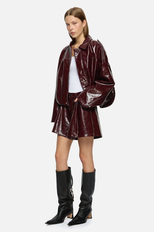 Image of a model wearing Shorts. Product name - Rita Shorts Burgundy in Burgundy colour by brand - Blanca Studio