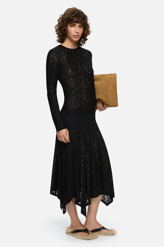 Image of a model wearing Skirts. Product name - Willow Skirt Black in Black colour by brand - Blanca Studio