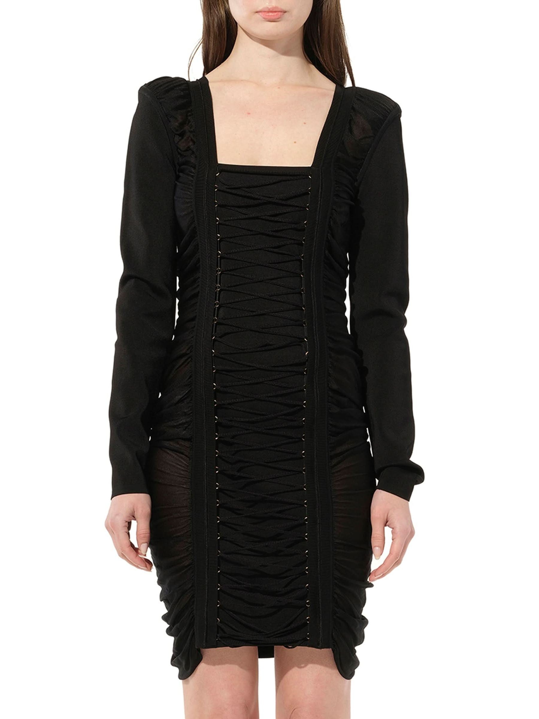 Image of a model wearing Dress. Productname: BALMAIN Maille Knit Const Dress in Black colour by brand - BALMAIN