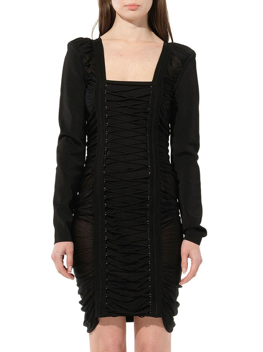 Image of a model wearing Dress. Productname: BALMAIN Maille Knit Const Dress in Black colour by brand - BALMAIN