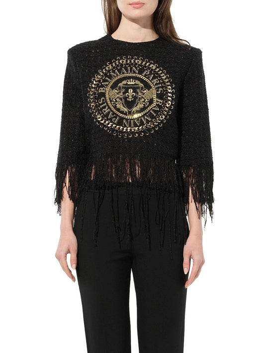 Image of a model wearing Tops. Productname: BALMAIN Top in Black colour by brand - BALMAIN