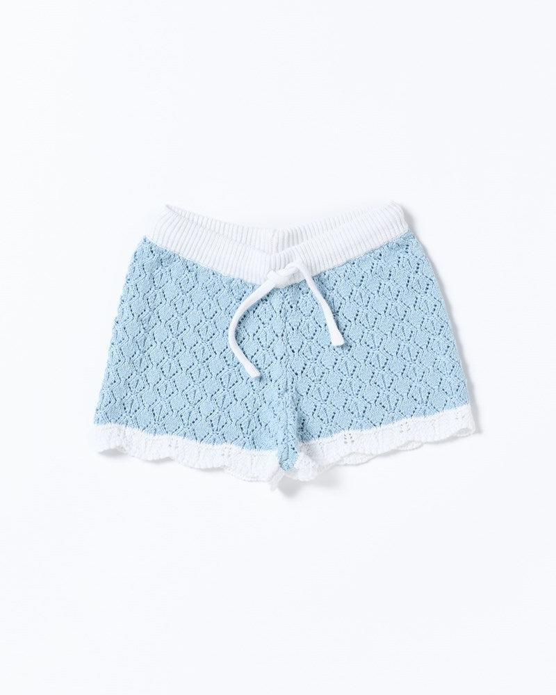 Image of a model wearing Shorts. Productname: Walnut Melbourne Bella Knit Short in Blue And White colour by brand - Walnut Melbourne