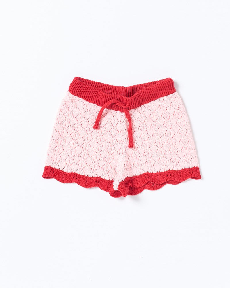 Image of a model wearing Shorts. Productname: Walnut Melbourne Bella Knit Short in Pink And Red colour by brand - Walnut Melbourne