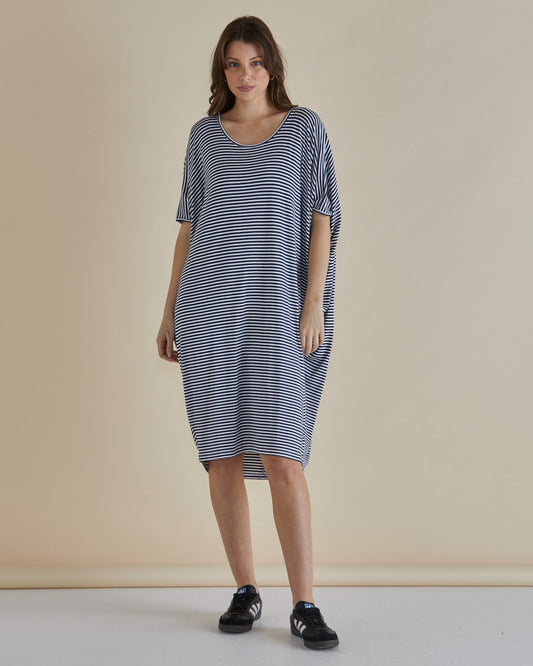 Image of a model wearing Tops. Productname: Betty Basics Maui T-Shirt Dress Navy Blue/White Stripe in Navy Blue/White Stripe colour by brand - Betty Basics
