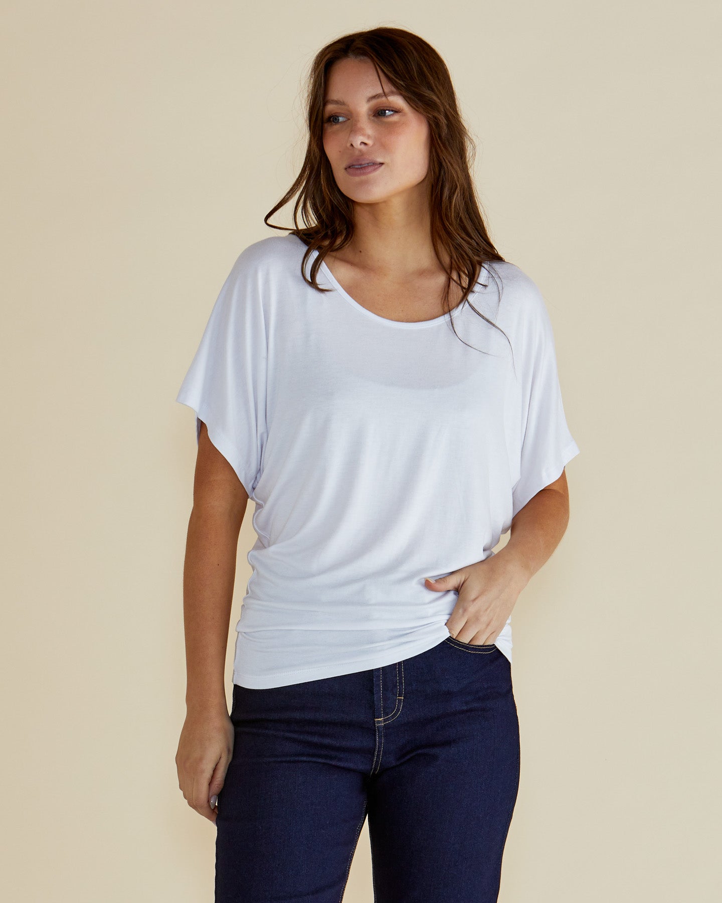 Image of a model wearing Tops. Productname: Betty Basics Maui Tee White in White colour by brand - Betty Basics