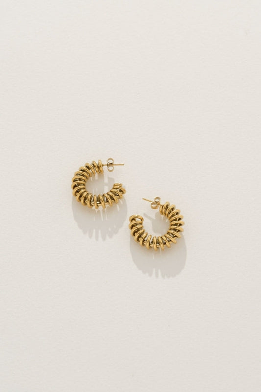 Image of Earrings. Product name - Spiral Hoop Earrings in Gold colour by brand - Reliquia Jewellery