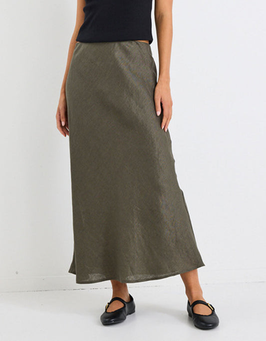 Image of a model wearing Skirts. Productname: Bliss Linen Bias Midi Skirt - in Khaki colour by brand - Re:Union The Label