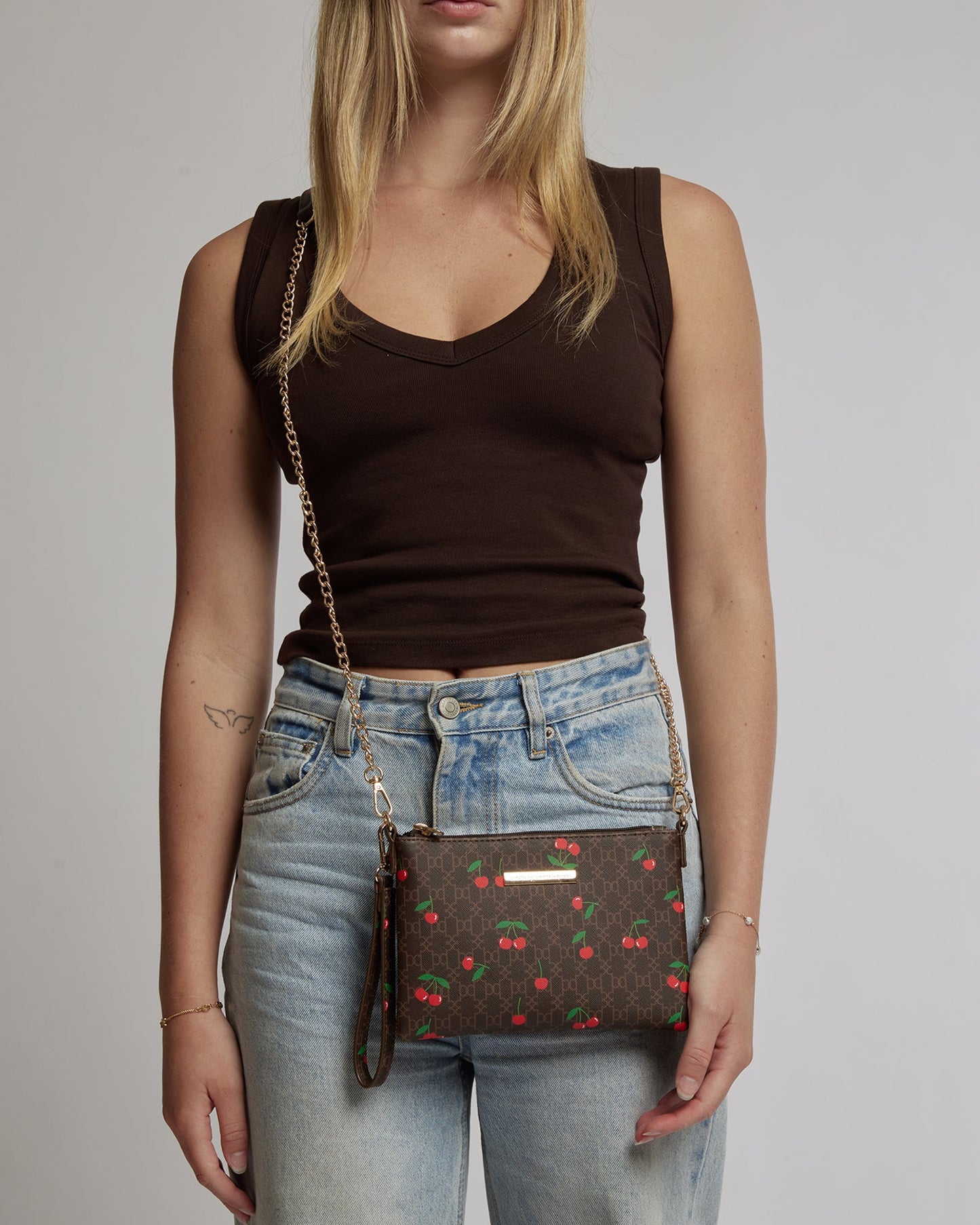 Image of Bags. Productname: Colette Print Peta Embroidery Wristlet in Print colour by brand - Colette