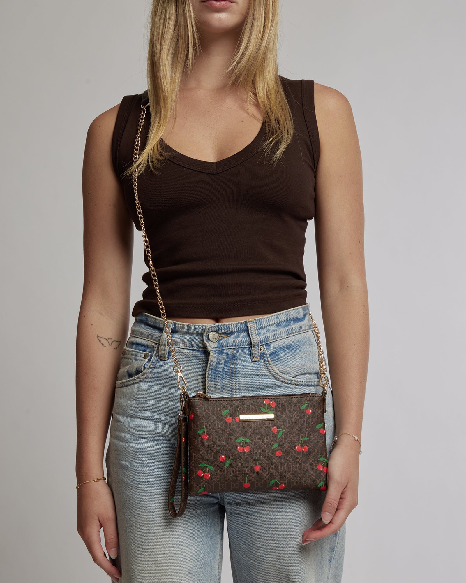 Image of Bags. Productname: Colette Print Peta Embroidery Wristlet in Print colour by brand - Colette