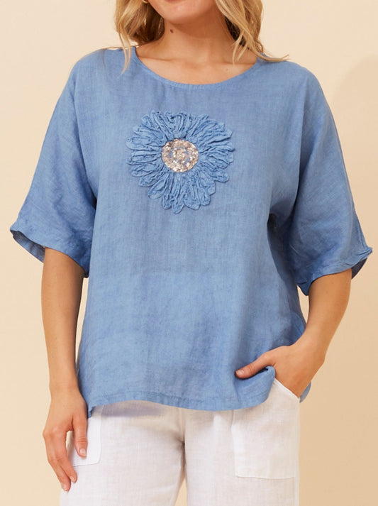 Image of a model wearing Tops. Productname: BOTTEGA MODA FLORAL LINEN PATCHWORK TOP in Jean colour by brand - Bottega Moda