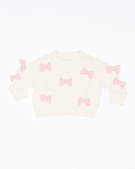 Image of a model wearing Outerwear. Productname: Walnut Melbourne Bow Knit jumper in Cream colour by brand - Walnut Melbourne