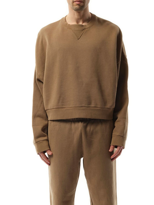 Image of a model wearing Outerwear. Productname: ENTIRE STUDIOS Box Sweatshirt in BROWN colour by brand - ENTIRE STUDIOS