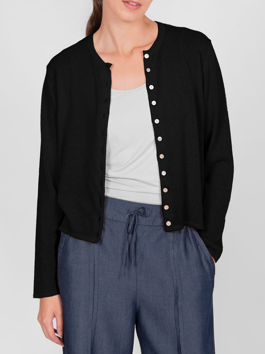 Image of a model wearing Outerwear. Productname: BRIDGE & LORD CURVED HEM CARDI in Black colour by brand - Bridge And Lord