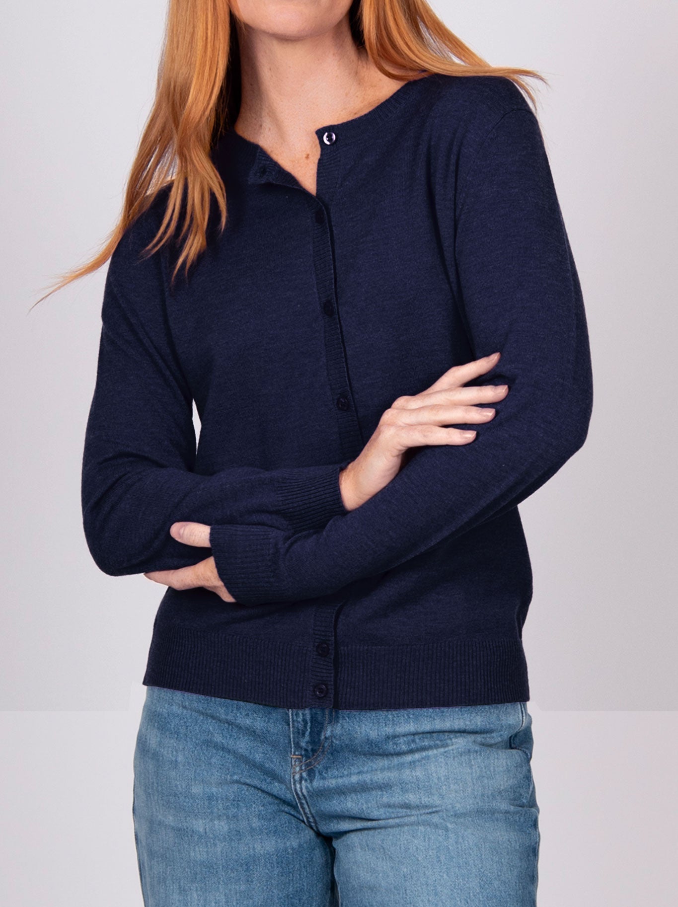 Image of a model wearing Outerwear. Productname: Bridge & Lord Kate Cardi in Navy colour by brand - Bridge And Lord