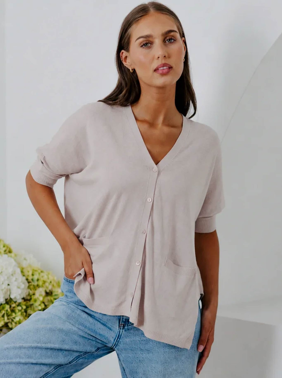 Image of a model wearing Outerwear. Product name - Bridge & Lord Oversize V Cardi in String colour by brand - Bridge And Lord