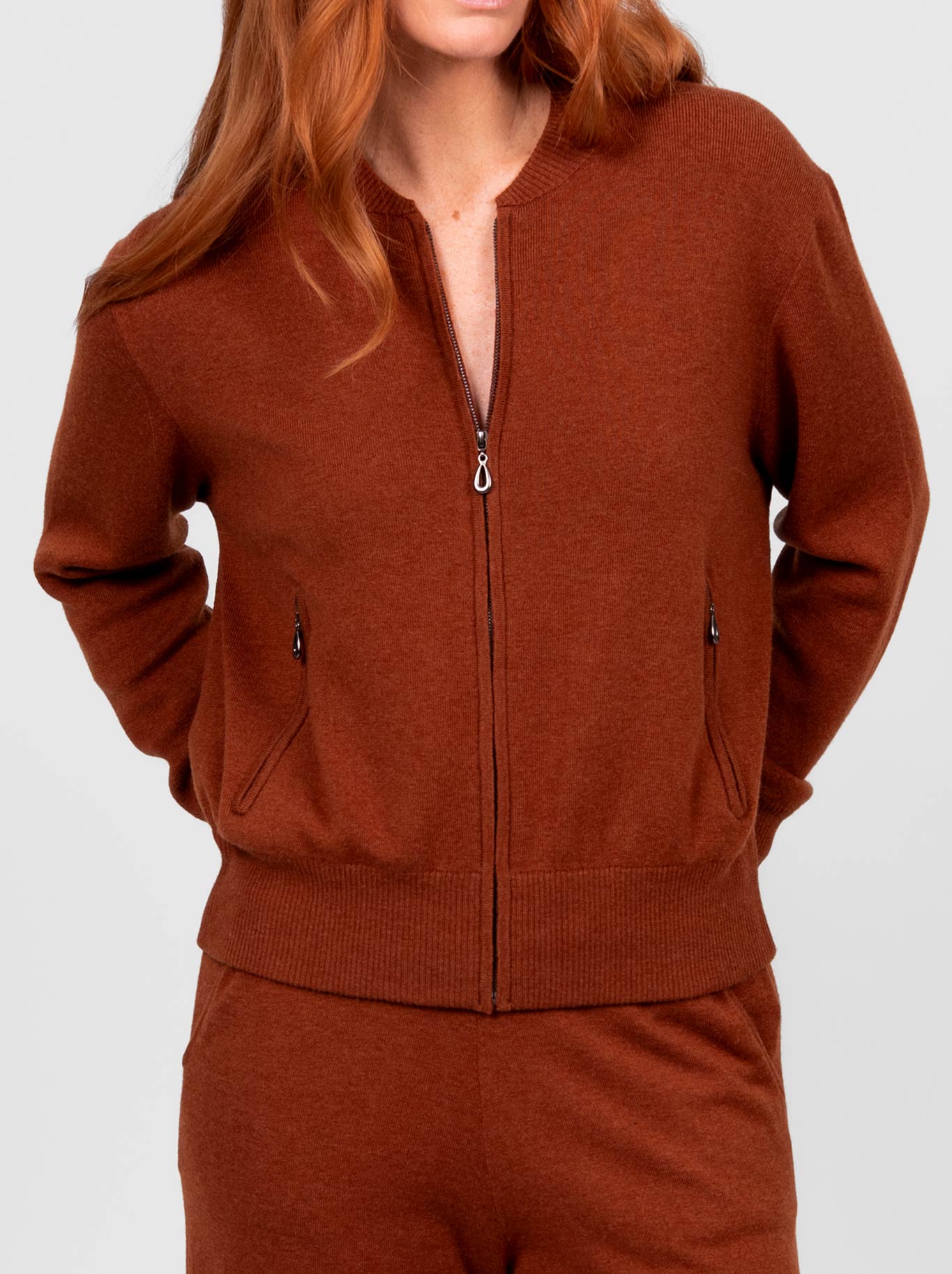 Image of a model wearing Outerwear. Product name - BRIDGE & LORD BOMBER JACKET in Cognac colour by brand - Bridge And Lord