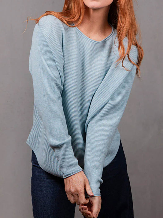 Image of a model wearing Outerwear. Product name - Bridge & Lord Dolman Rib Pullover in Cayenne colour by brand - Bridge And Lord