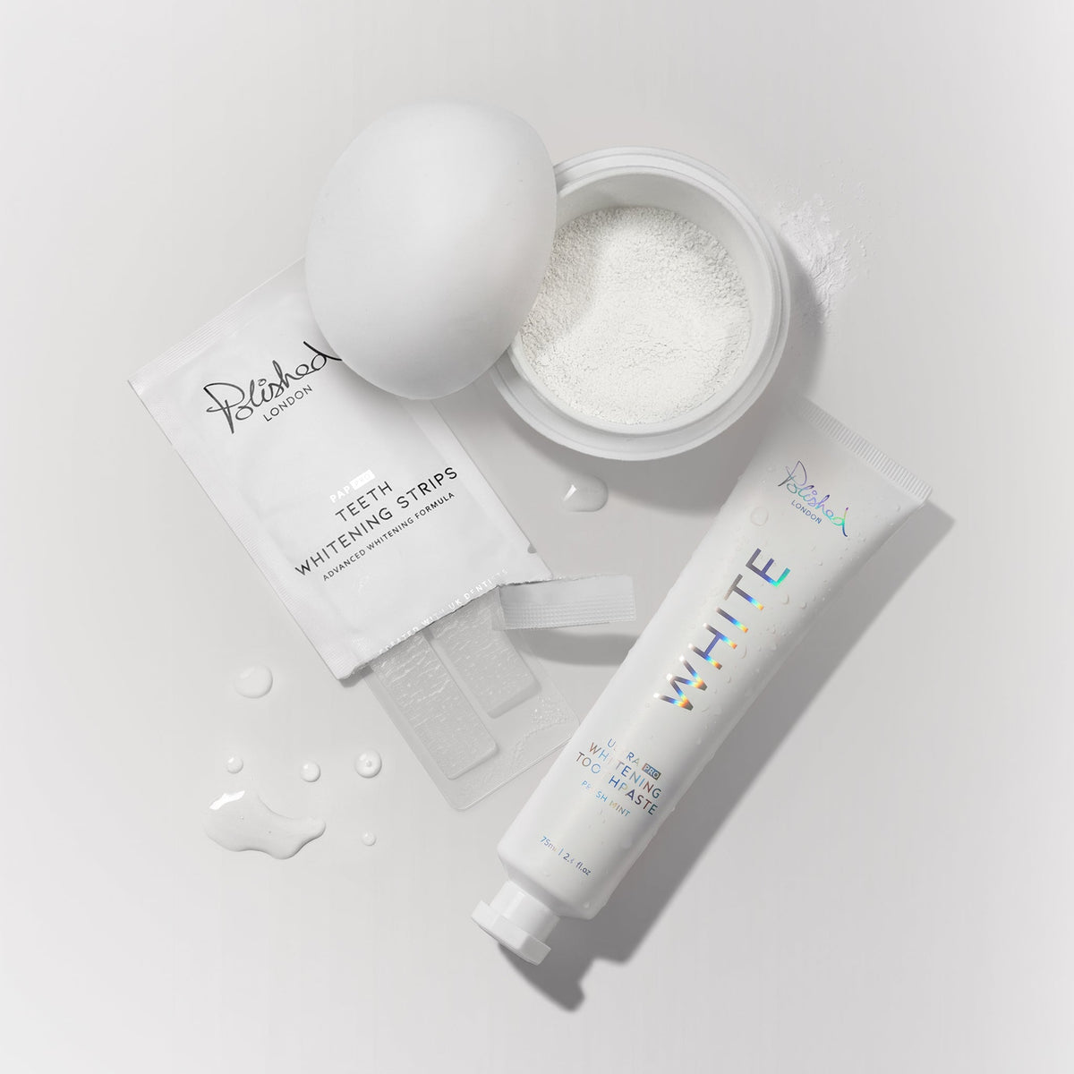 Image of Teeth Whiteners. Product name - Ultra White Toothpaste + Teeth Whitening Powder + Teeth Whitening Strips Bundle in colour by brand - Polished London