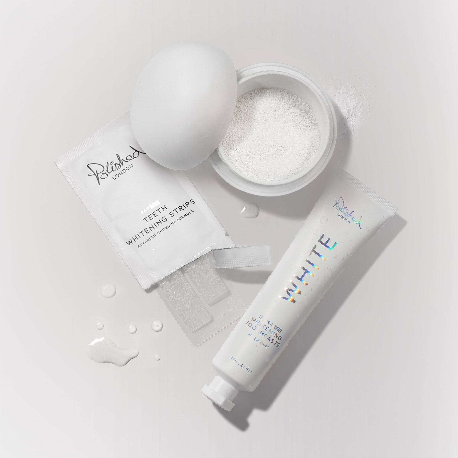Image of Teeth Whiteners. Product name - Ultra White Toothpaste + Teeth Whitening Powder + Teeth Whitening Strips Bundle in colour by brand - Polished London