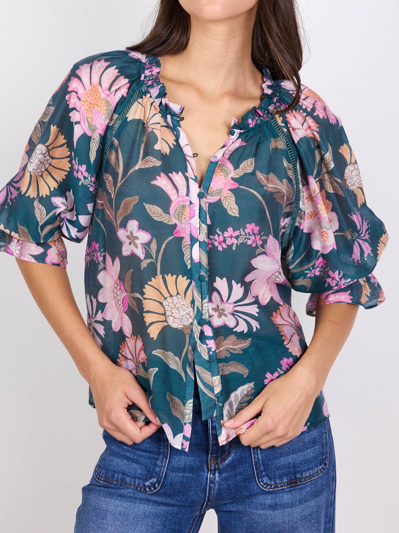 Image of a model wearing Tops. Product name - By Rosa Encounter Gathered Button Top in Petrol colour by brand - By Rosa