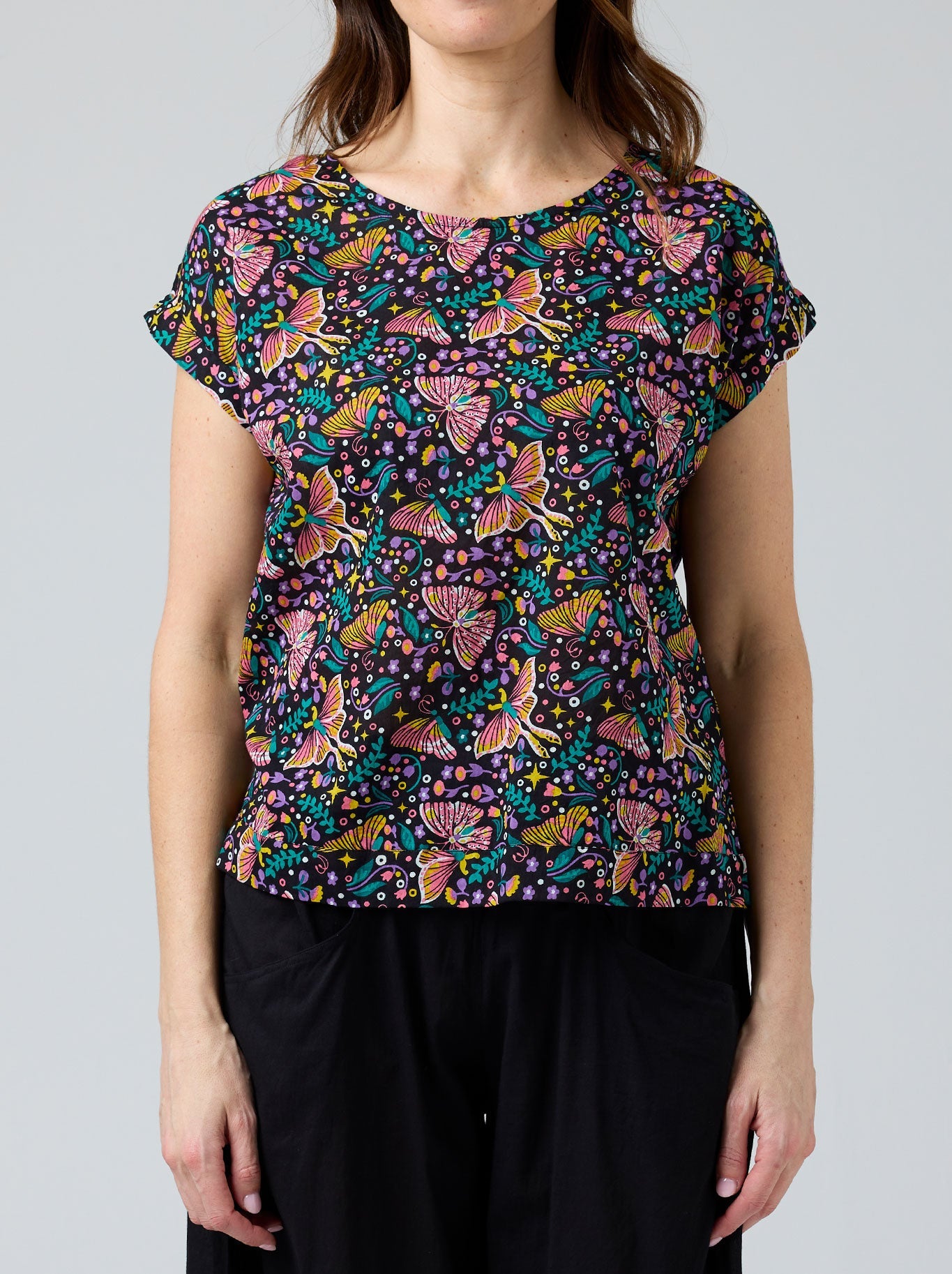 Image of a model wearing Tops. Productname: Cake Vicky Round Neck in Butterfly colour by brand - Cake