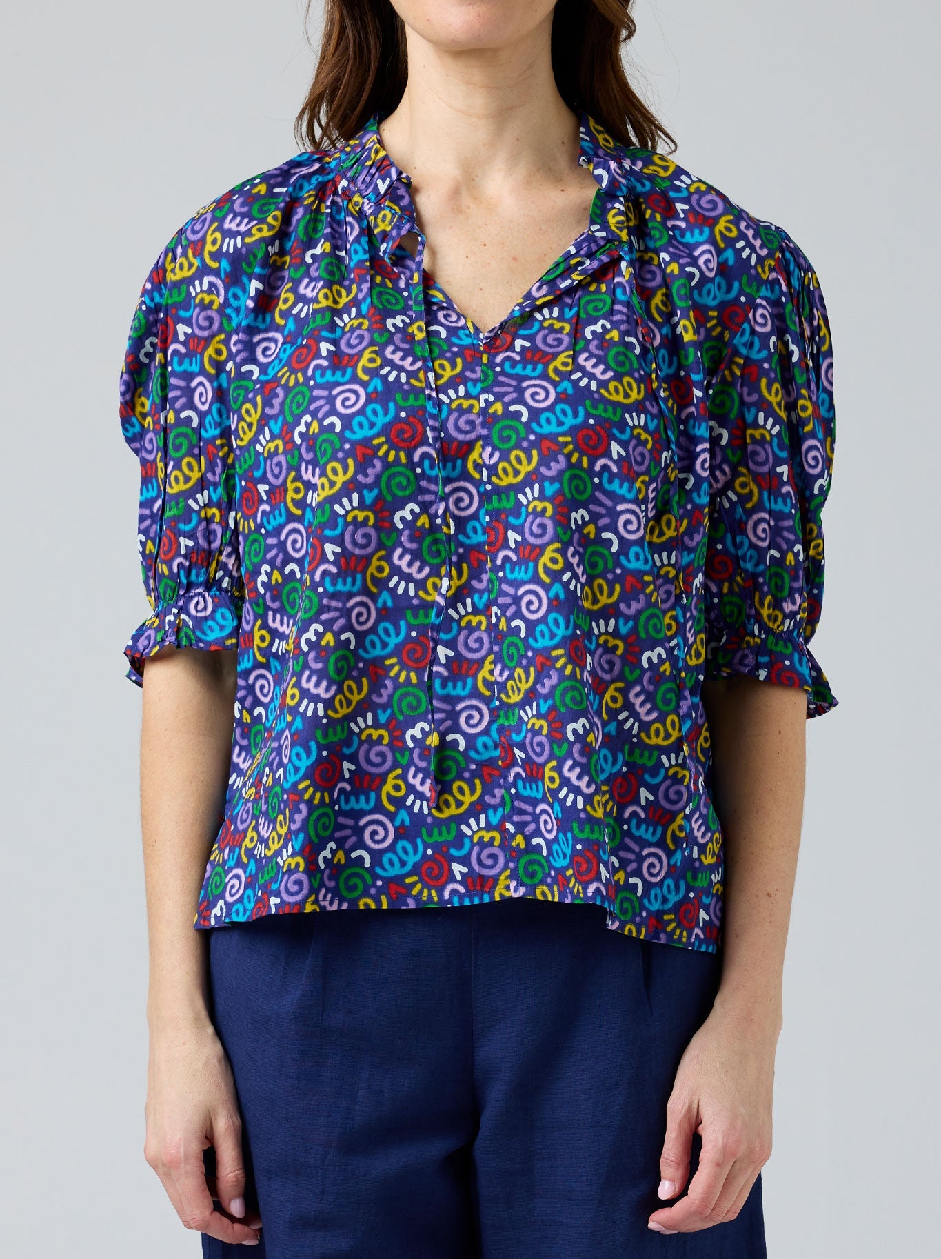 Image of Blouses. Product name - Cake Tie Neck Blouse in Folk Flower colour by brand - Cake