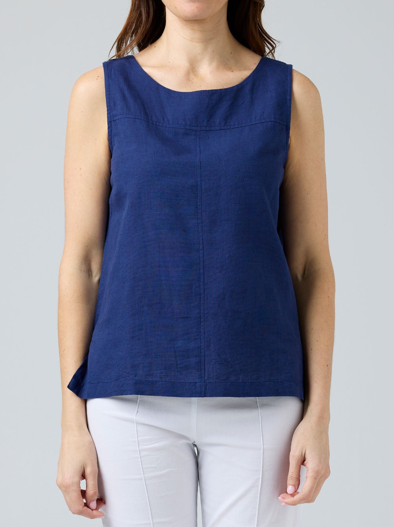 Image of a model wearing Tops. Productname: Cake Tallie Linen Tank in Green colour by brand - Cake