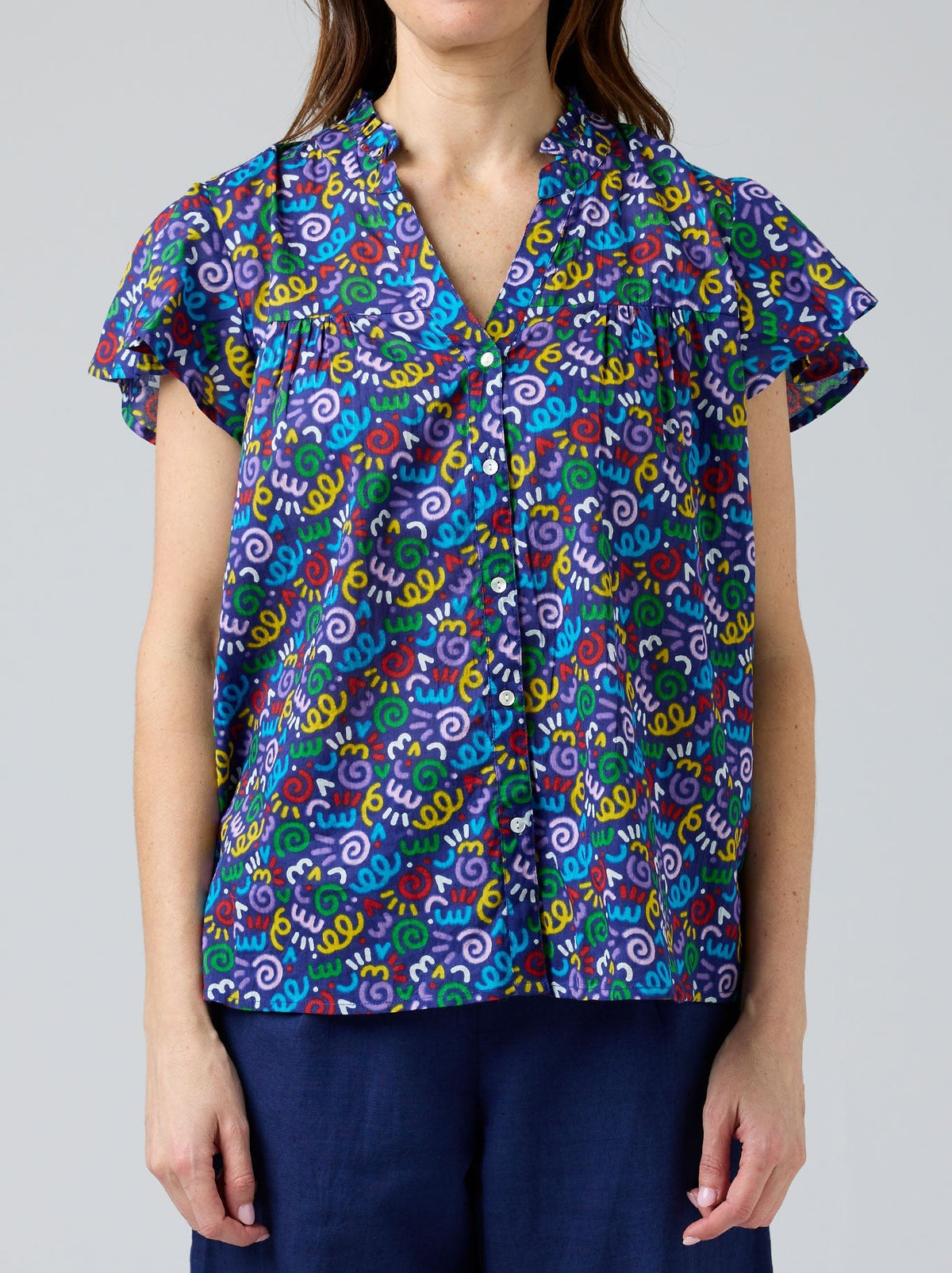 Image of a model wearing Tops. Product name - CAKE JESS TOP in Pink Block colour by brand - Cake