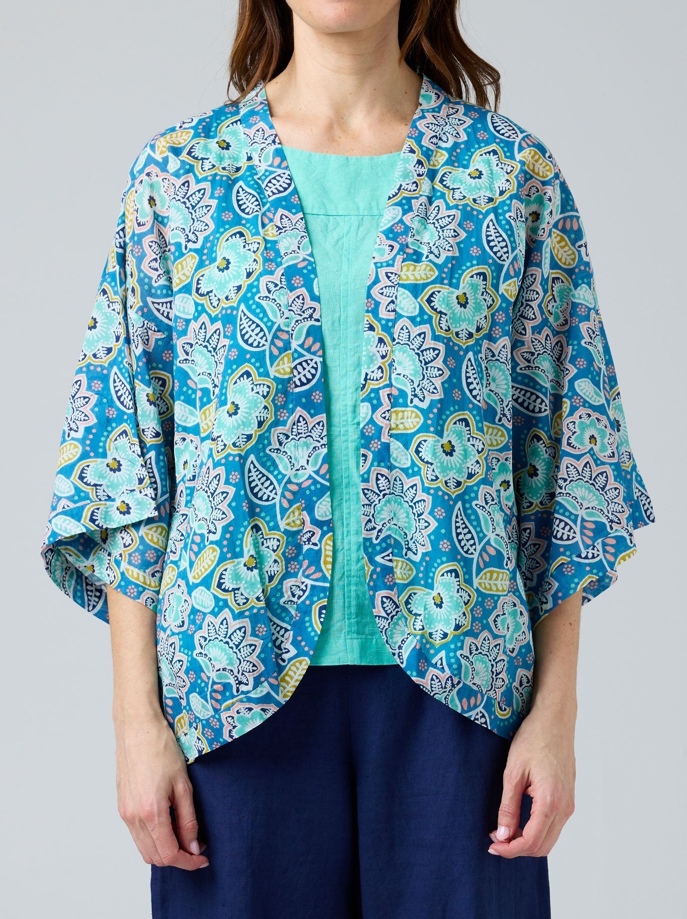 Image of a model wearing Tops. Product name - CAKE KIMONO in Butterfly colour by brand - Cake