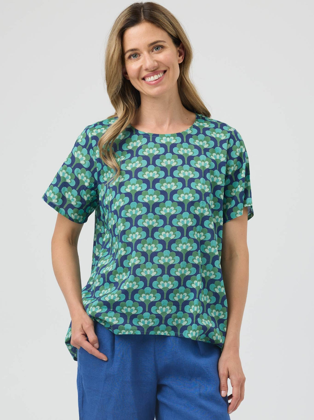 Image of a model wearing Tops. Product name - Cake Zimmi Top in Broccoli colour by brand - Cake