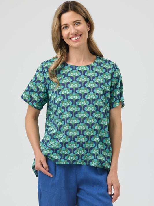Image of a model wearing Tops. Product name - Cake Zimmi Top in Broccoli colour by brand - Cake