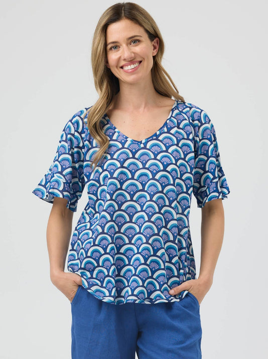 Image of a model wearing Tops. Product name - Cake Kim Top in Blue Arches colour by brand - Cake