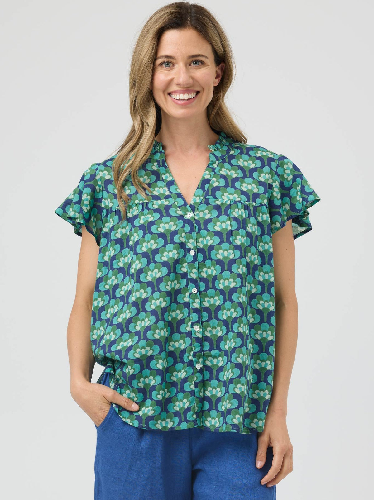 Image of a model wearing Tops. Product name - Cake Jess Top in Broccoli colour by brand - Cake