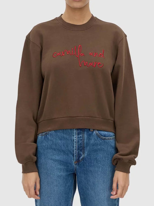 Image of a model wearing Tops. Product name - CAMILLA AND MARC MAREN CROP TRACKSUIT TOP in Chocolate colour by brand - Camilla And Marc