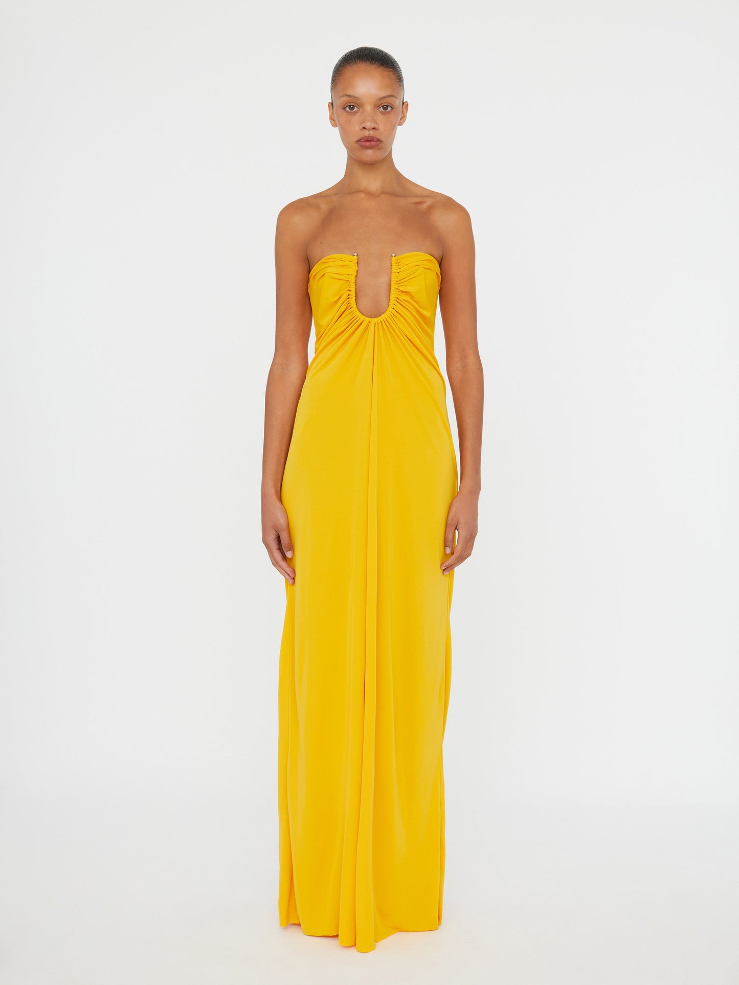 Image of Dresses. Productname: Christopher Esber Arced Palm Strapless Dress in Saffron colour by brand - Christopher Esber