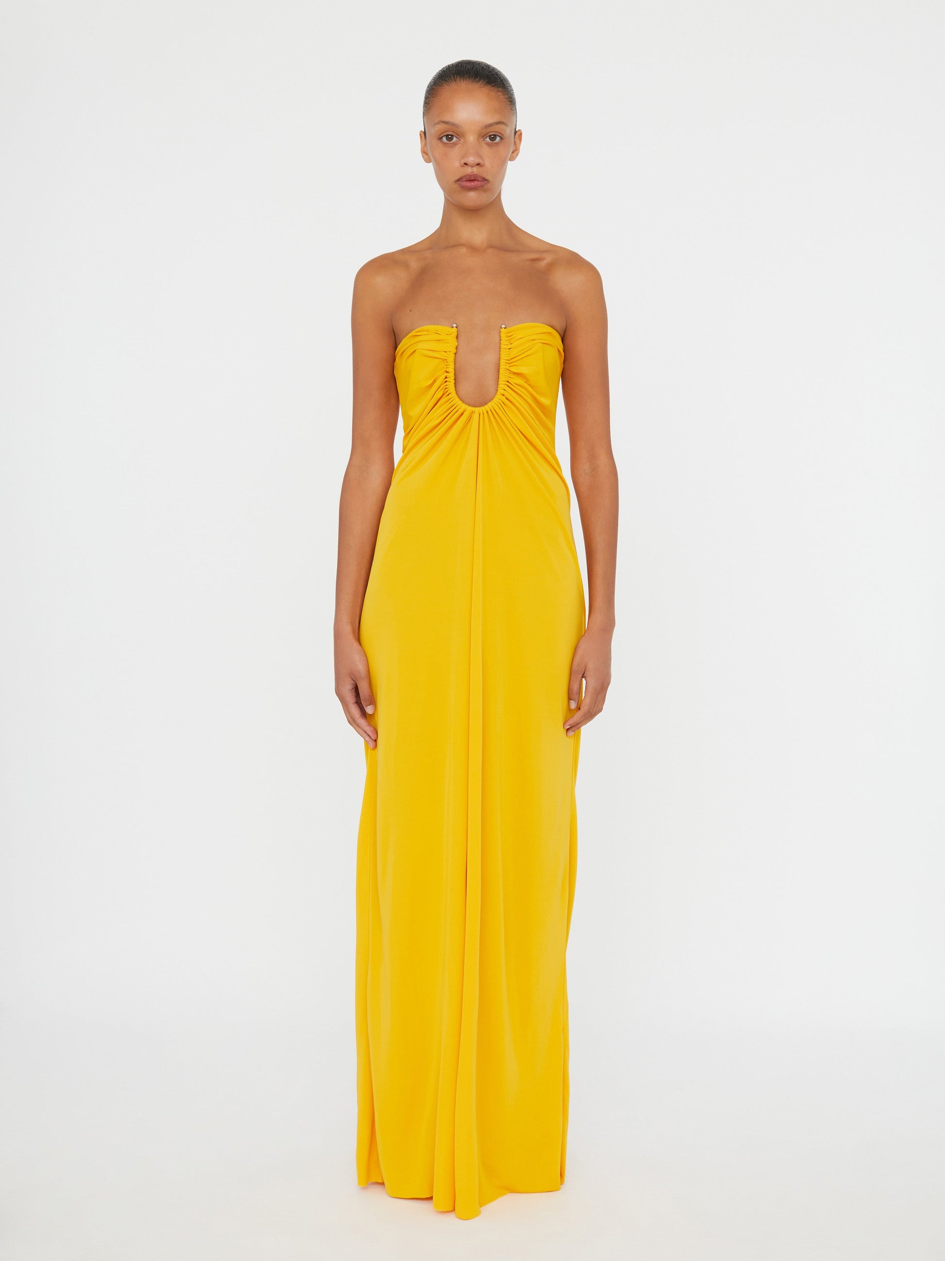 Image of Dresses. Productname: Christopher Esber Arced Palm Strapless Dress in Saffron colour by brand - Christopher Esber