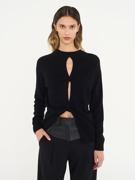 Image of a model wearing Outerwear. Productname: Christopher Esber Monument Open Twist Sweater in Black colour by brand - Christopher Esber