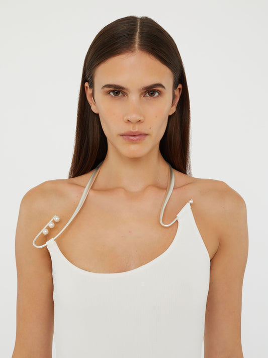 Image of a model wearing Tops. Productname: Christopher Esber Levitate Knit Top in White colour by brand - Christopher Esber