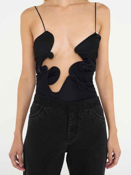 Image of a model wearing Tops. Productname: Christopher Esber Molded Venus Bodysuit in Black colour by brand - Christopher Esber