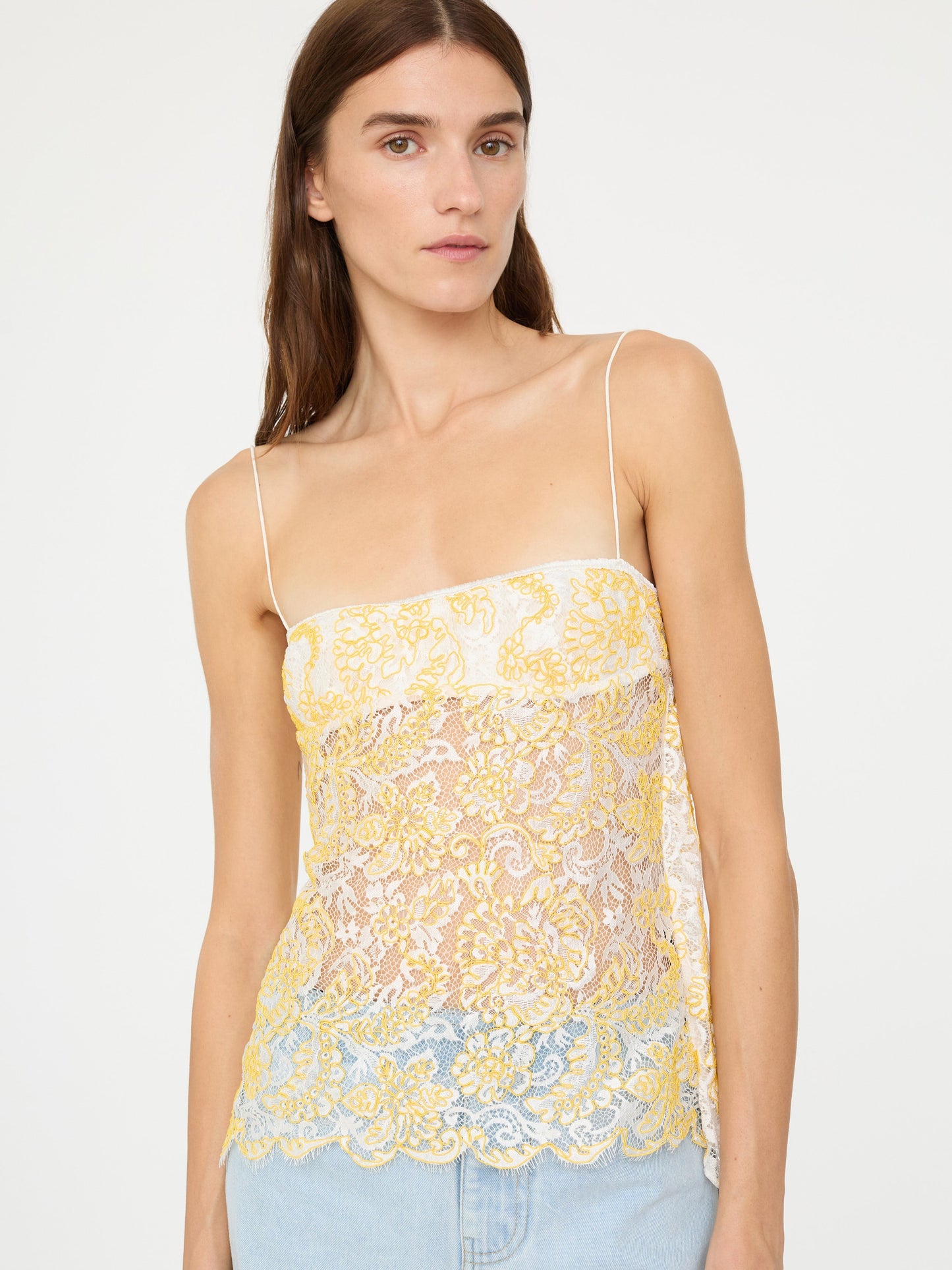 Image of a model wearing Tops. Product name - Floating Lace Balconette Cami in Yellow colour by brand - Christopher Esber