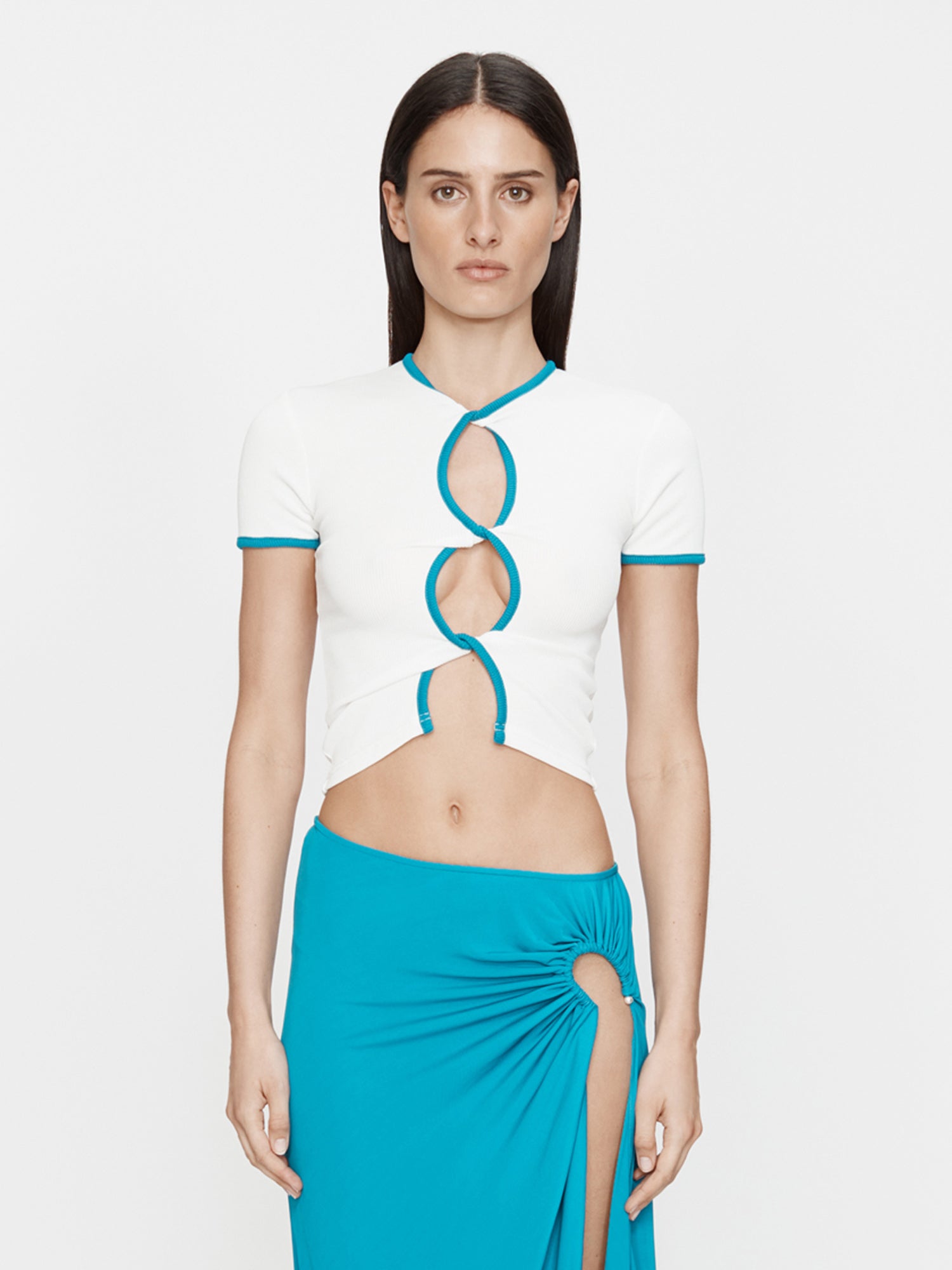 Image of a model wearing Tops. Productname: Christopher Esber Open Twist Contrast Bind Tee in Tee colour by brand - Christopher Esber