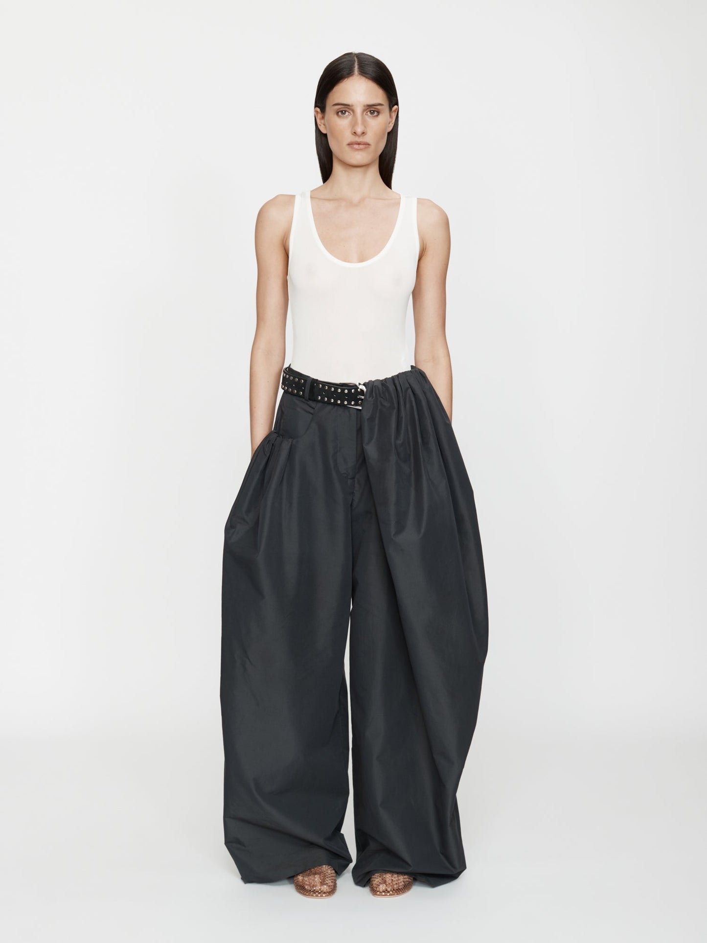 Image of a model wearing Pants. Productname: Christopher Esber Cocoon Taffeta Trouser in Trouser colour by brand - Christopher Esber