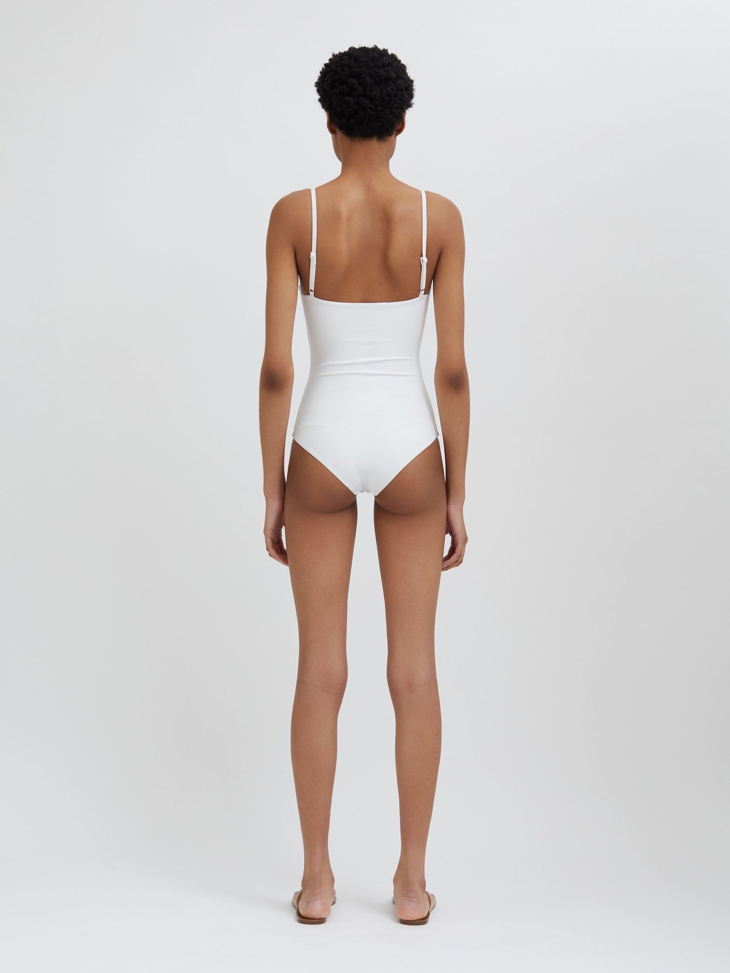 Embargo Pierced Orbit One Piece (White)